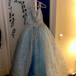 Size 8 medium, baby blue, selling with skirt(makes dress poofy), matching cape